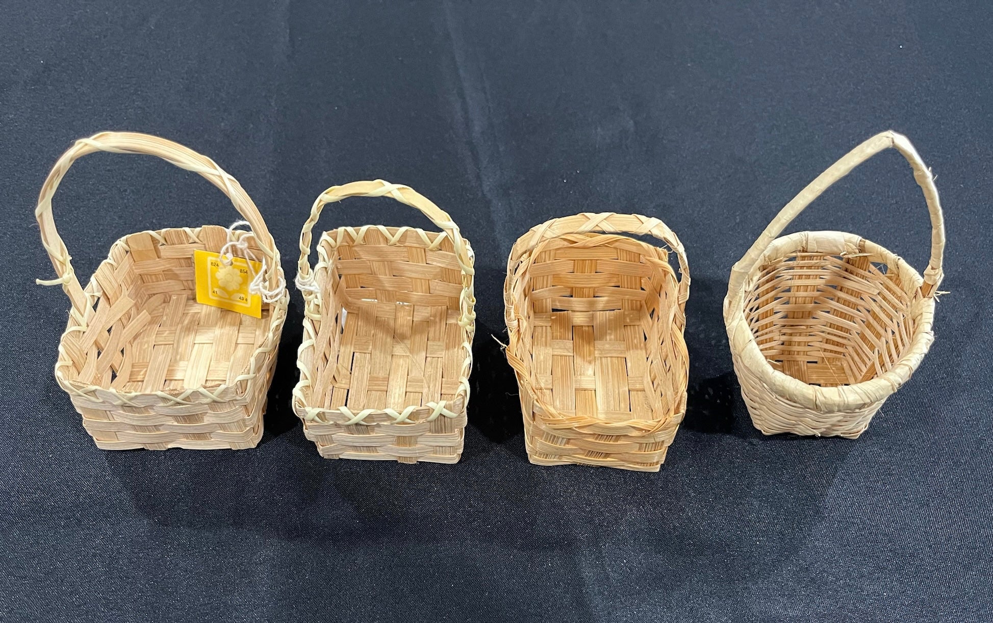 Four Mini Woven Baskets image 0