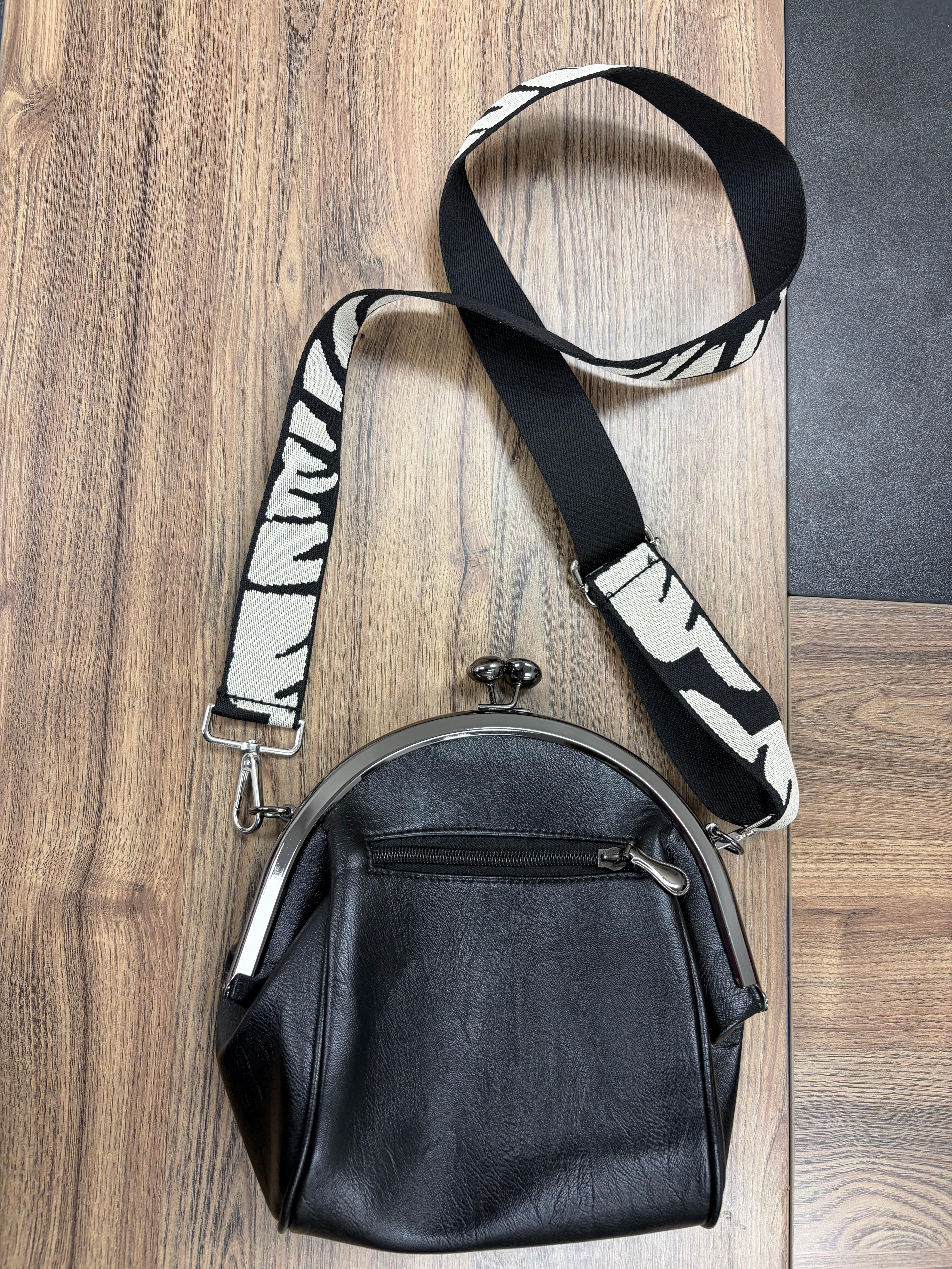 Used Black Purse with Black and White Strap