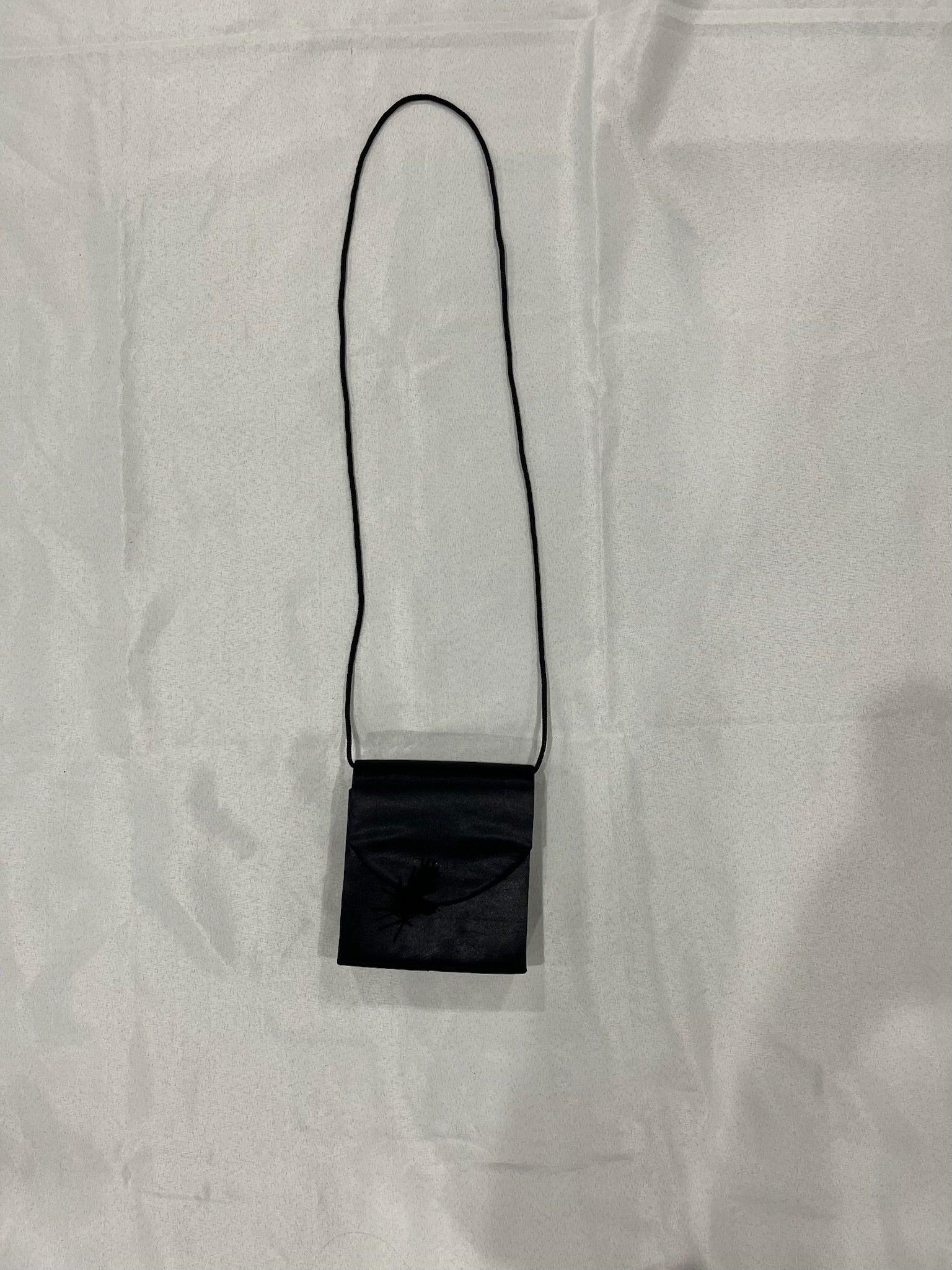 Small Black Purse With Front Tassel image 0