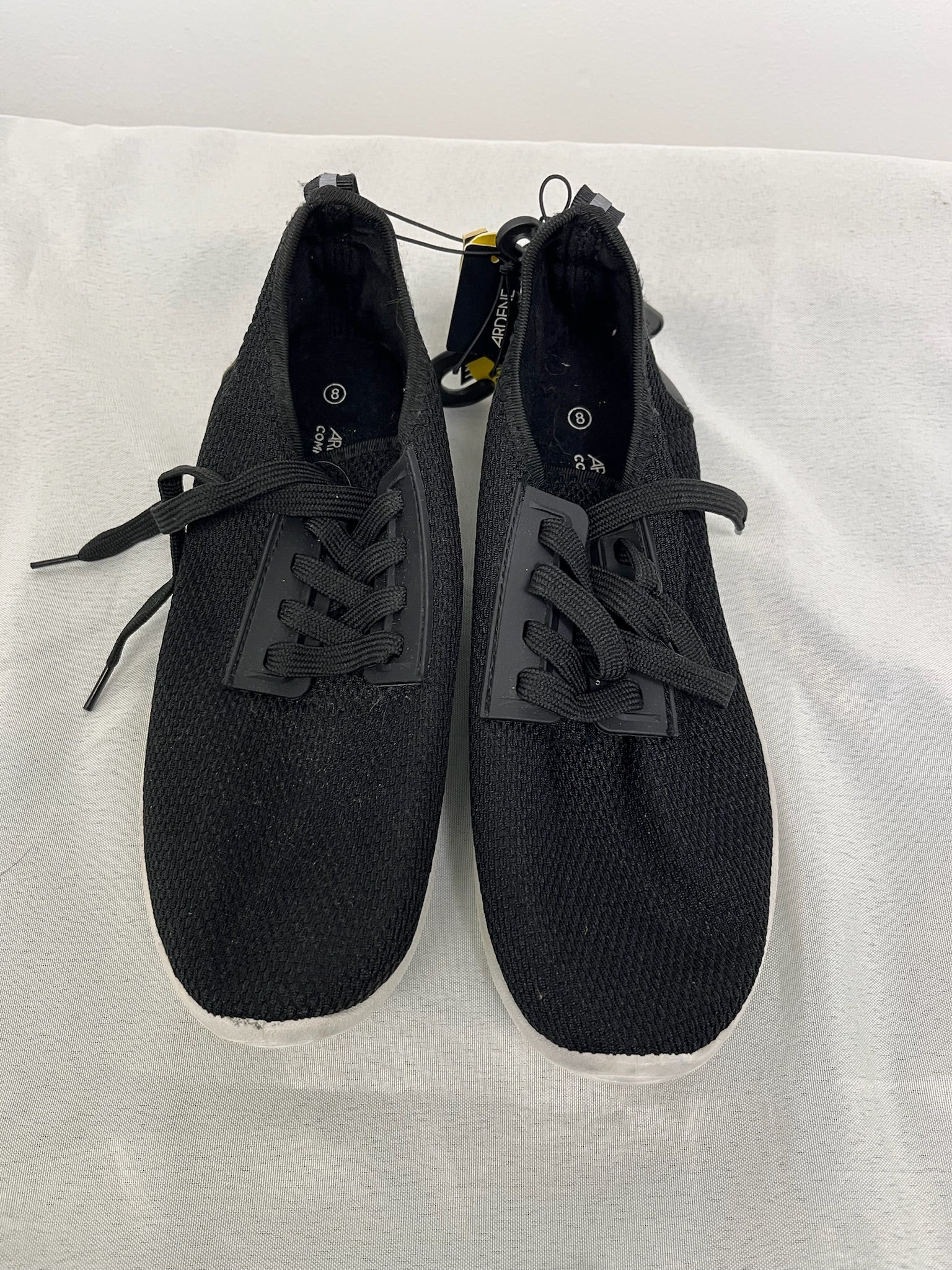 Women’s Black Slip On Sneakers image 0