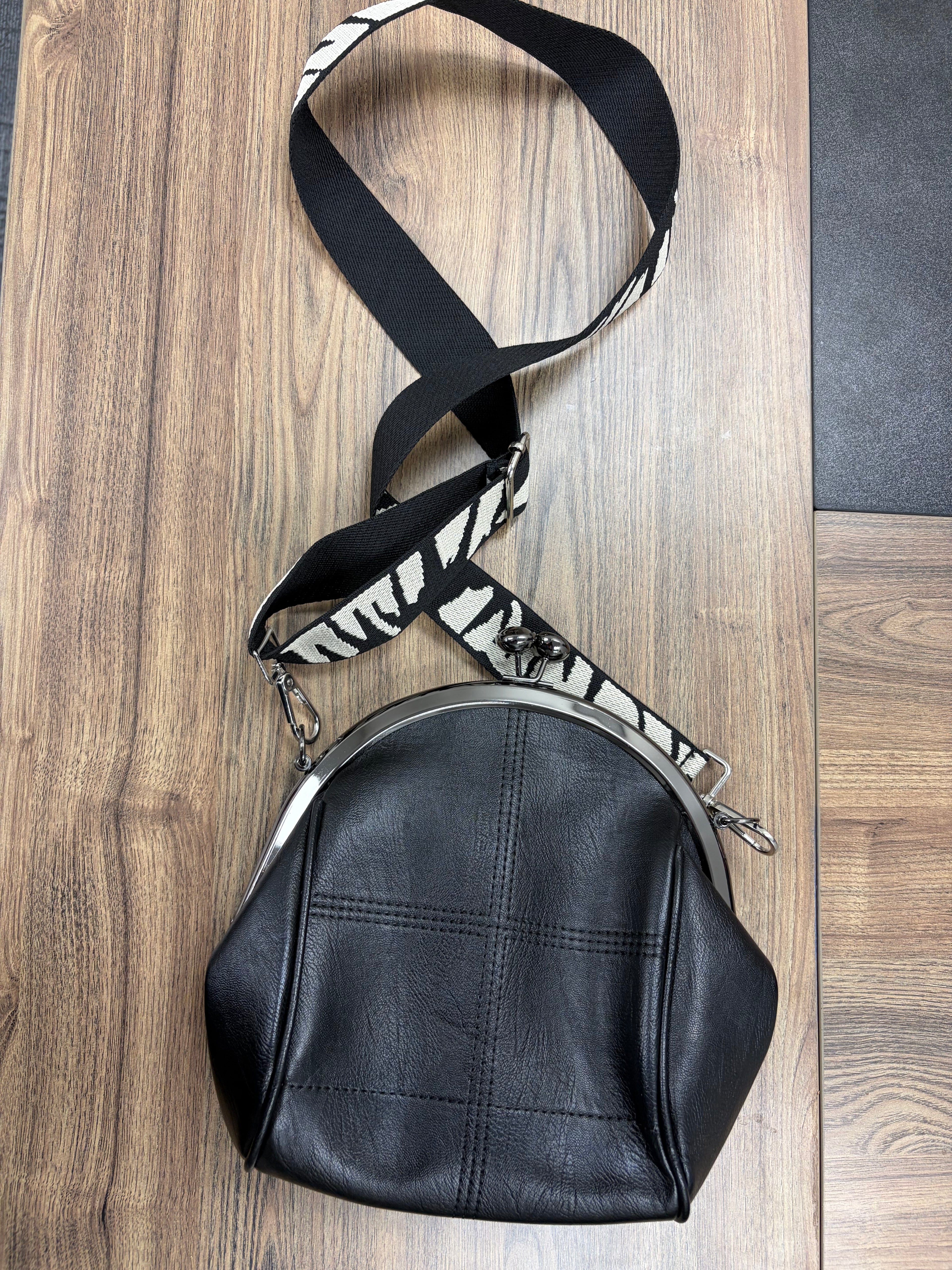 Used Black Purse with Black and White Strap