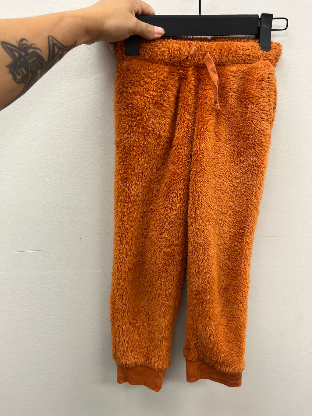 Used children’s Orange Fuzzy Sweats