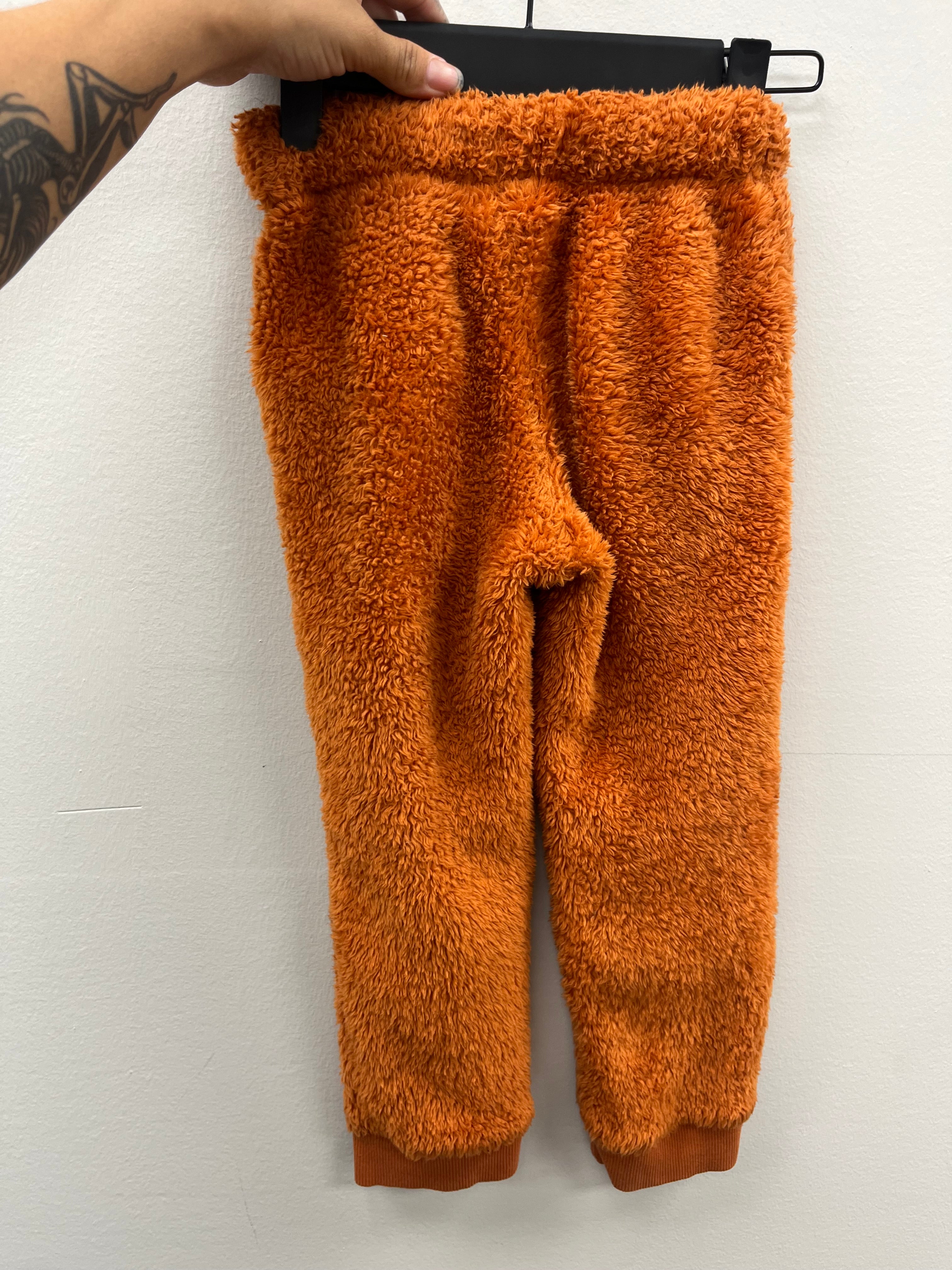 Used children’s Orange Fuzzy Sweats